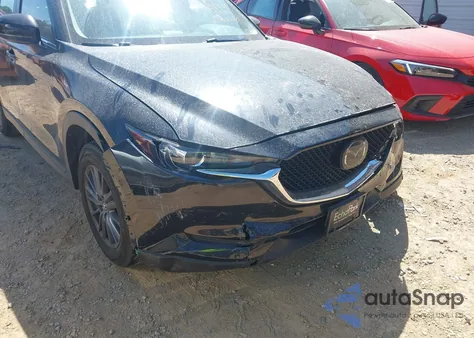 2021 Mazda Cx-5 Sport z USA, uszkodzony, nr VIN JM3KFBBM1M0398352